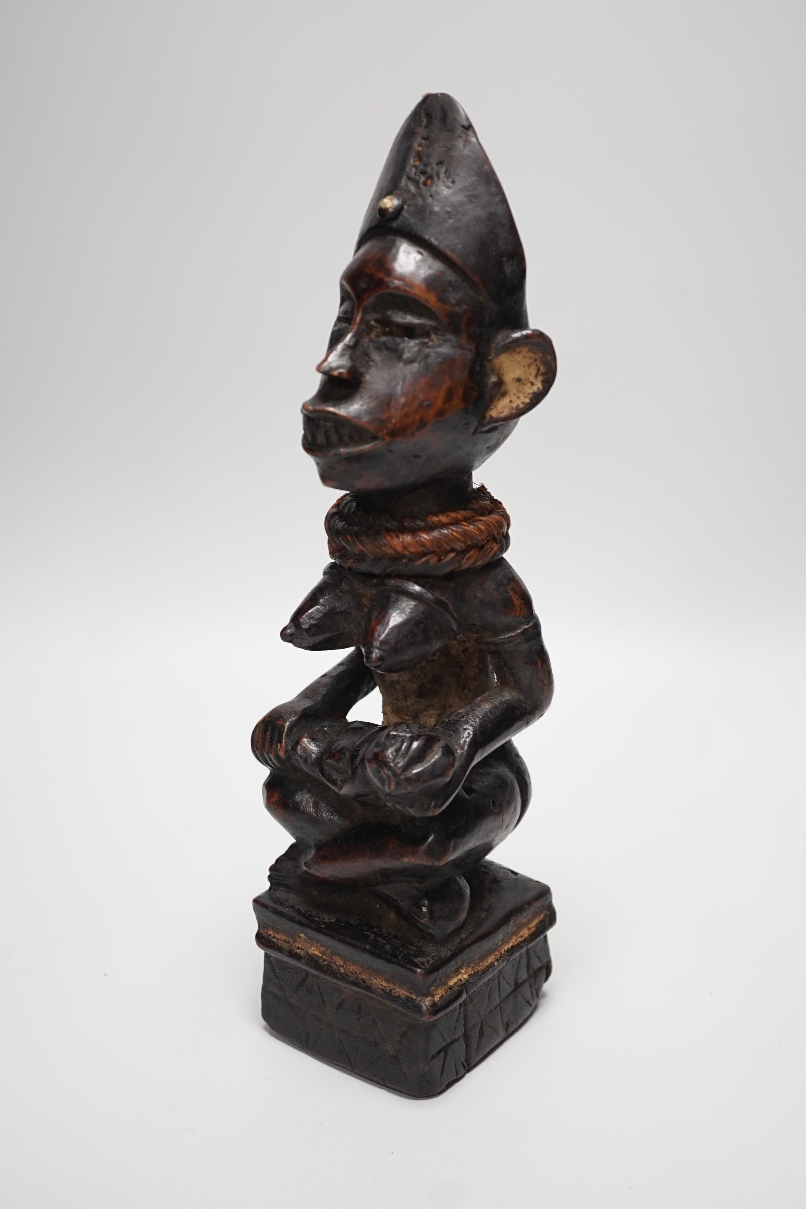 An African tribal wooden maternity figure, Yombe tribe Congo 30cm